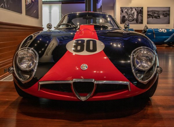 Тази TZ-1 е карана през 60-те от Надийн Бренгъл, една от едва шепата жени, успели да си пробият път до моторния спорт в онази епоха. Бренгъл дори печели с нея шампионата South Pacific в своя клас. 
Днес тази кола често е наричана "бейби GTO" заради приликите си с легендарното 
Ferrari 250 GTO. Alfa Romeo Tubolare Zagato е с тръбна рама, алуминиев копус и мощен 4-цилиндров мотор. Произведени са само 120 бройки, което прави колата истинска мечта за колекционерите.
